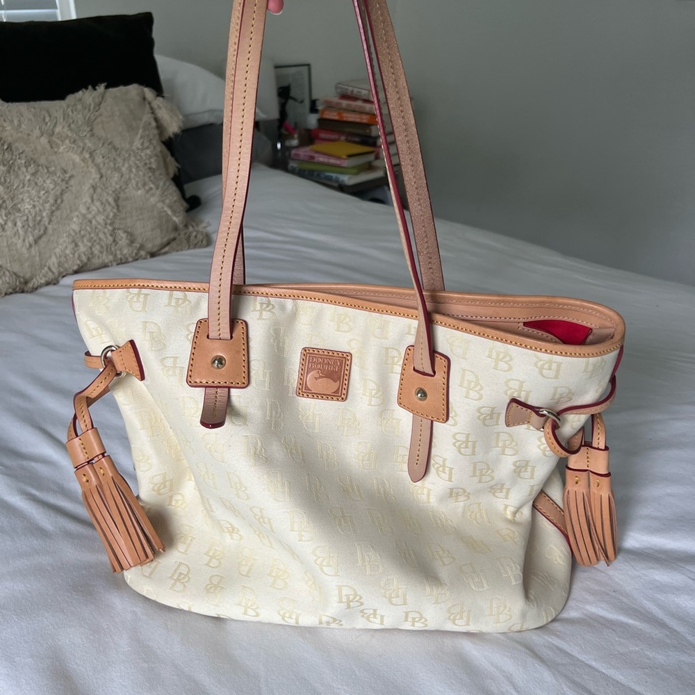 Cream Dooney! Small stain, pictured, used once. Dust bag included.